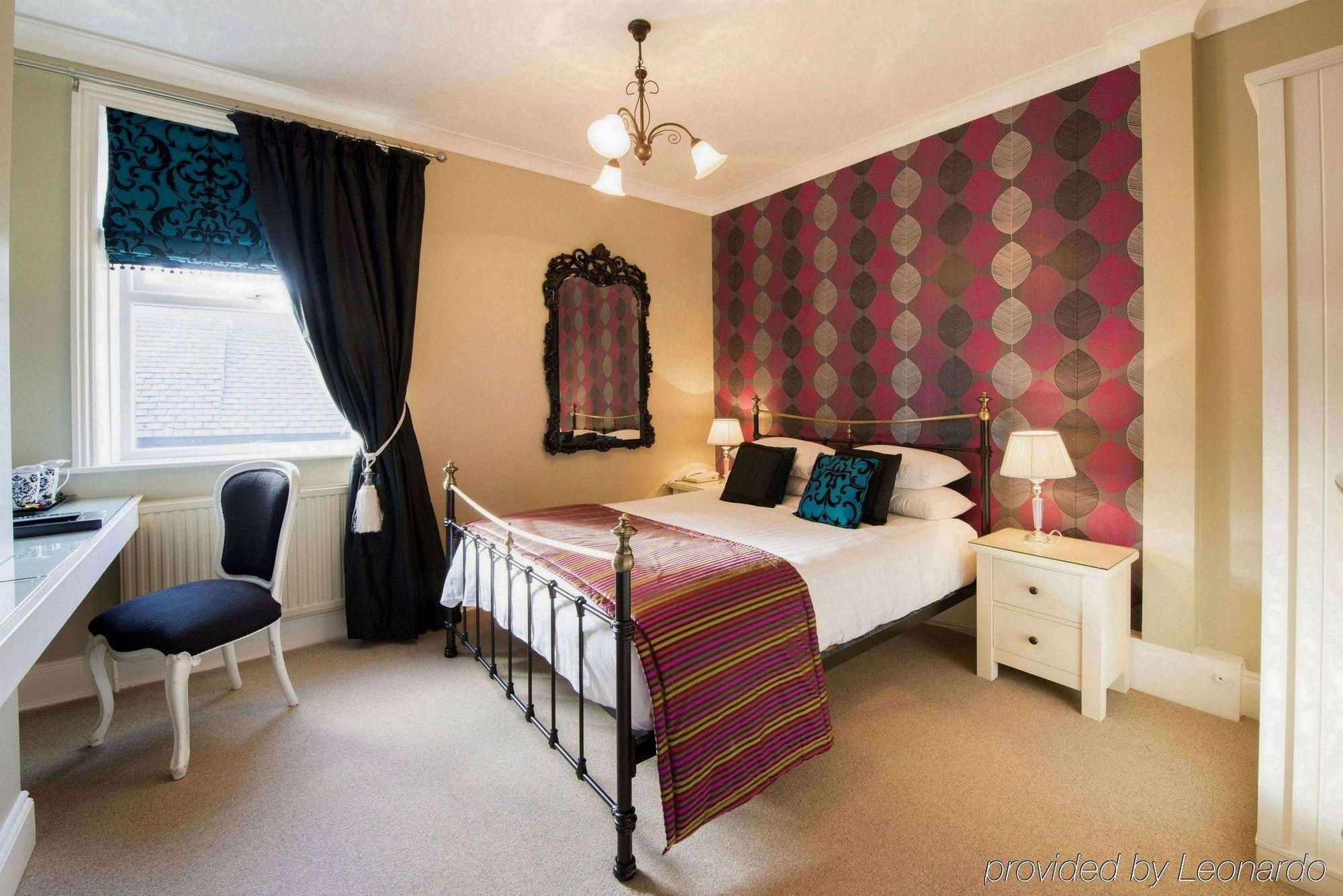 格拉夫顿精品酒店 哈罗盖特 外观 照片 A bedroom at the hotel